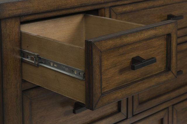 Signature Design by Ashley® Taffenbrook Medium Brown Dresser-2
