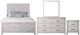 New Classic® Home Furnishings Biscayne 4-Piece Driftwood Queen Panel Bedroom Set-0