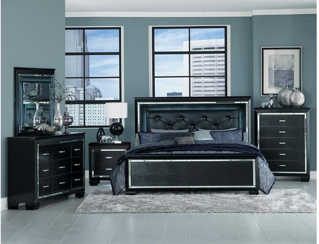 front view of a modern glam bedroom with a black and metallic bed frame and matching furniture