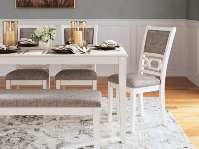 Front view of a modern dining room with a dining table with bench