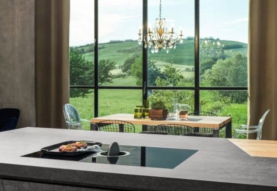 Credit: Elicia Front view of a modern kitchen with a downdraft induction cooktop