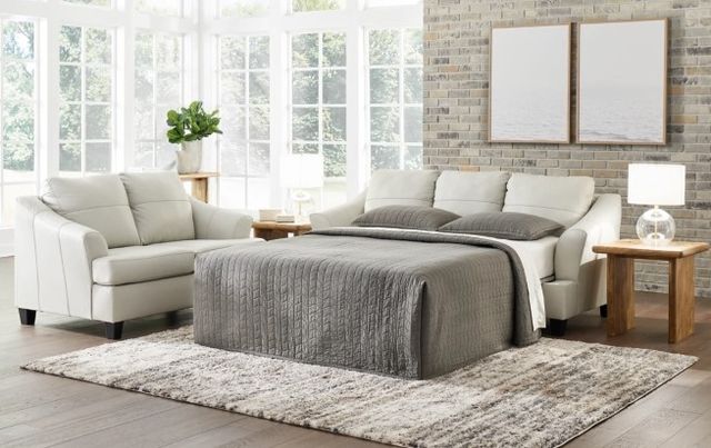 front view of a white sofa bed and matching loveseat 