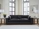 Signature Design by Ashley® Emilia 2-Piece Black Small Spaced Sectional-1