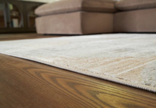 Signature Design by Ashley® Truward Caramel/Gray/Linen 5'x7' Area Rug-3