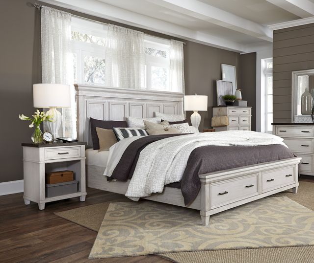 Bed frame with white linens