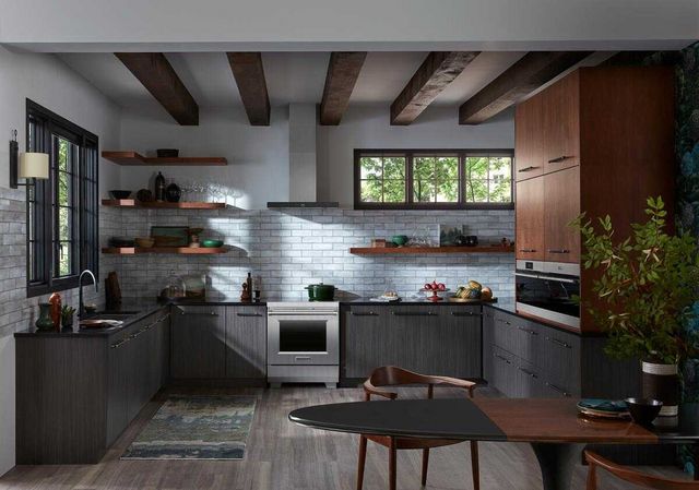 front view of a rustic kitchen with a freestanding wolf electric range