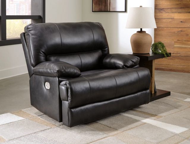 view of a black reclining chair and a half in a modern living room