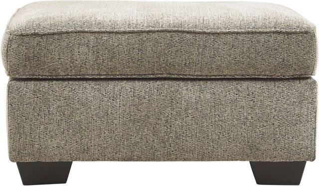 Benchcraft® McCluer Mocha Ottoman-1