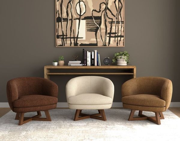 A contemporary living room featuring a patterned swivel chair