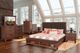 New Classic® Home Furnishings Cagney 4-Piece Chestnut California King Panel Bedroom Set-1