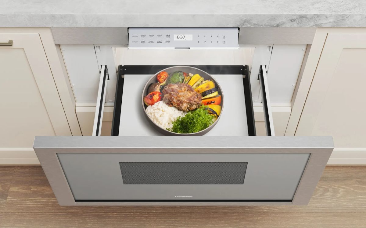 Microwave Drawer Under-Counter Installation Sleek stainless steel microwave drawer installed in an island