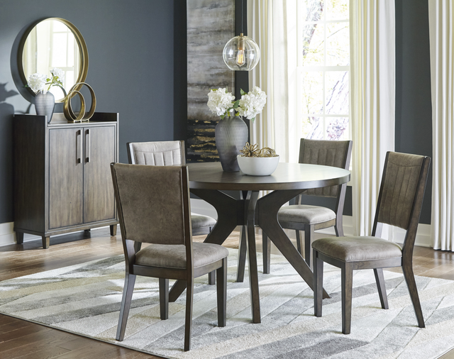 Front view of a modern bar cabinet in a dining room with a matching table and chairs