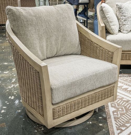 Signature Design by Ashley® Alden Peak Beige/Light Gray Fabric/Wicker/Wood Outdoor Swivel Lounge Chair with Cushion-1