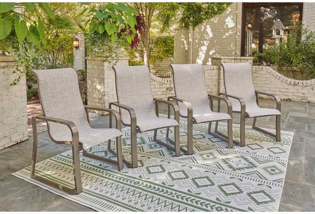 Signature Design by Ashley® Beach Front 4-Piece Beige Aluminum/Fabric Outdoor Arm Chair Set-4