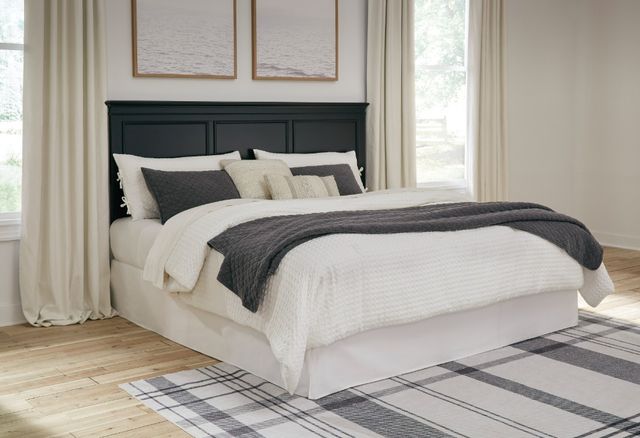 Tall sleeper on a bed