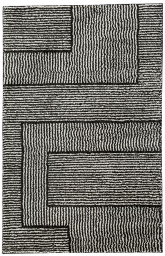 Signature Design by Ashley® Kurtmen Black/Ivory 5'x7' Area Rug-0