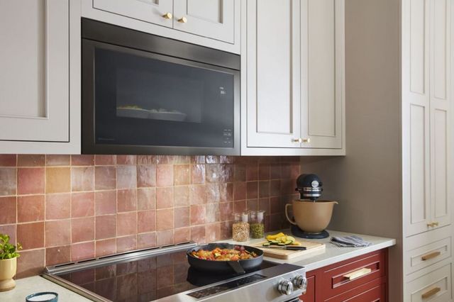 KitchenAid® 1.1 Cu. Ft. Black Stainless Steel Over The Range Microwave -8