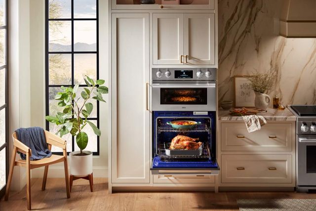 Front view of a modern kitchen with an SKS oven and microwave combo