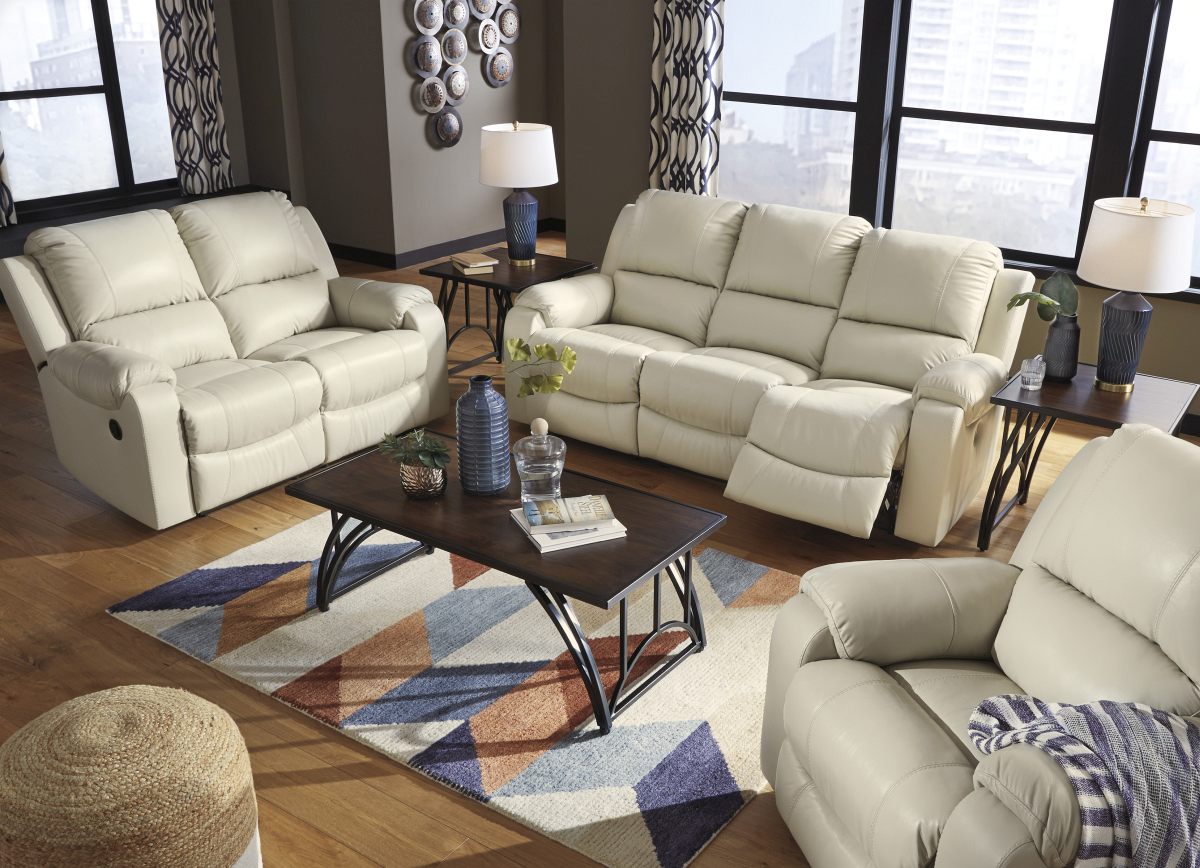 Signature Design by Ashley Rackingburg Cream Reclining Sofa Farnham s Furniture Galleries Casper Wyoming