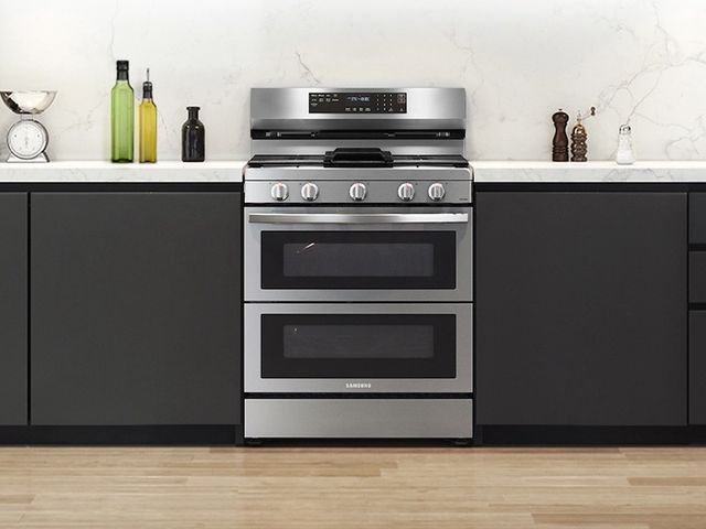 front view of an LG double oven gas range in a modern kitchen