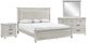 New Classic® Home Furnishings Silver Sands 4-Piece Gray King Panel Bedroom Set-0