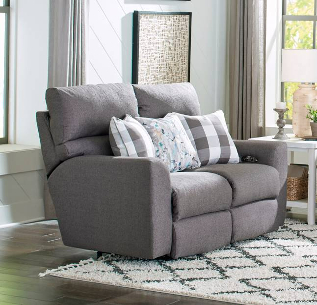 Living room with a large comfortable reclining sofa Living room with a large comfortable reclining sofa